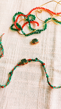 Handcrafted Lotus Rakhi | Elegant Red & Green Braided Rakhi Thread